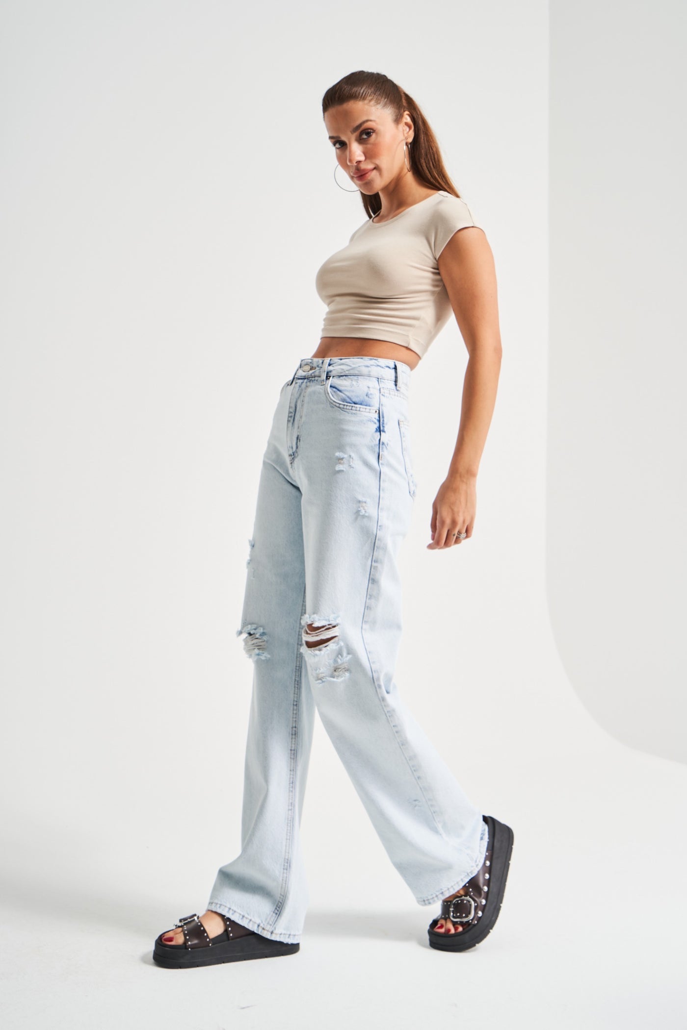 KAYA HIGH-WAIST RIPPED JEANS