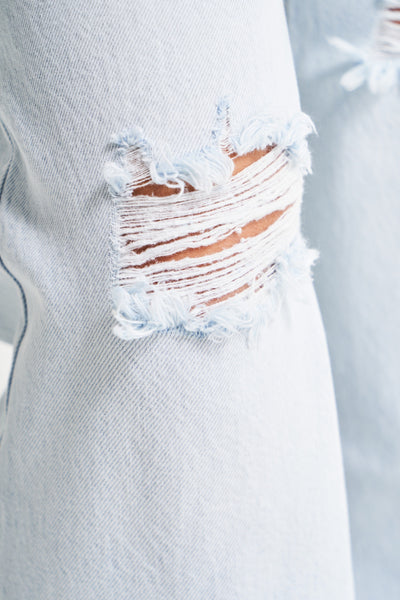 KAYA HIGH-WAIST RIPPED JEANS