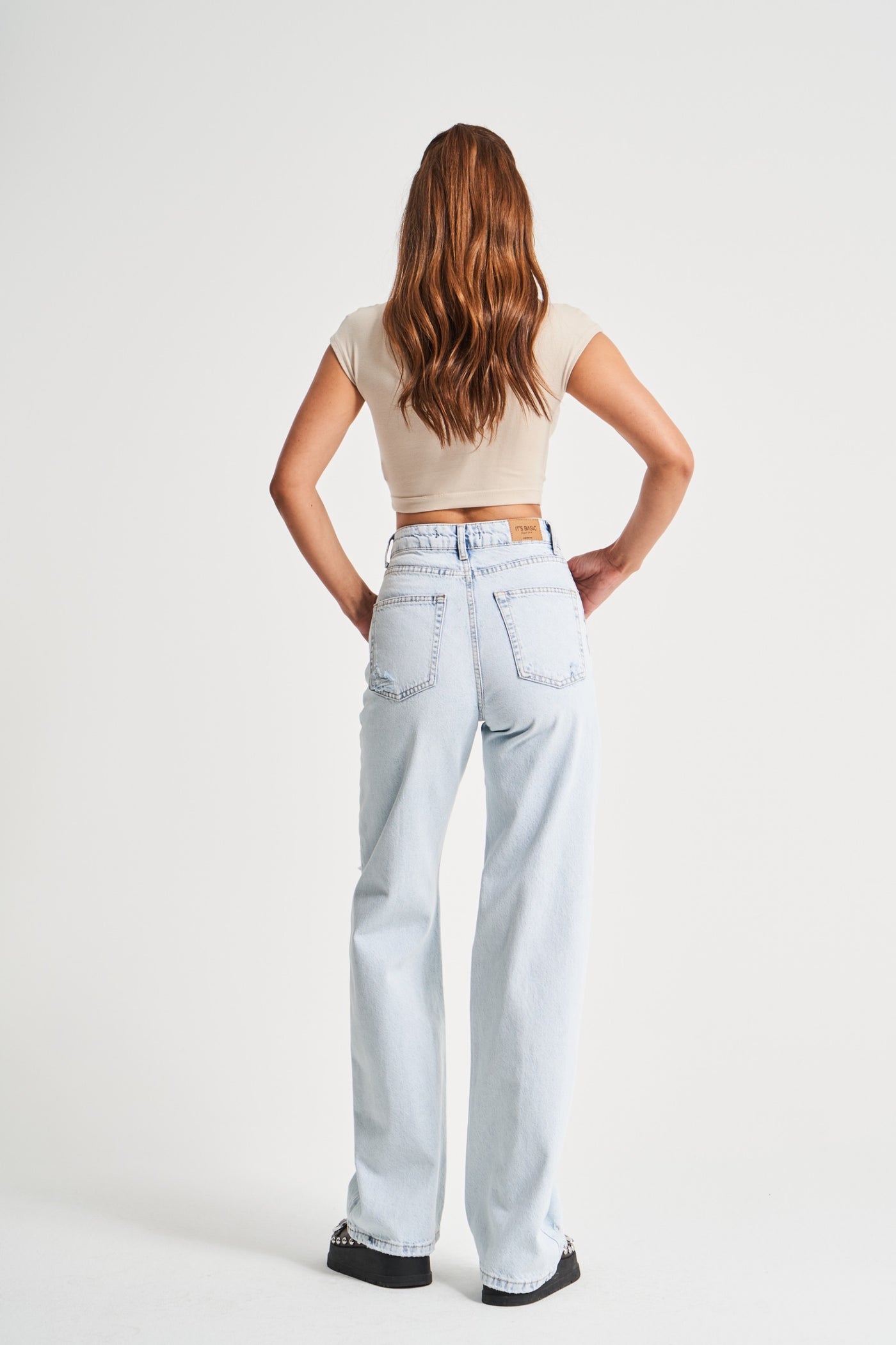 KAYA HIGH-WAIST RIPPED JEANS