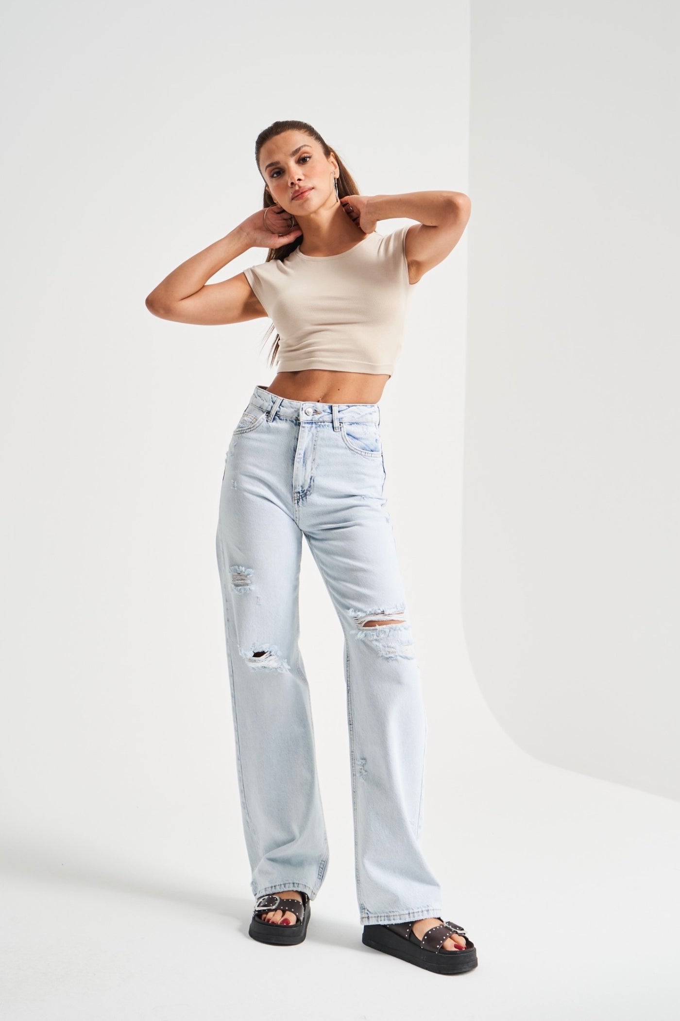 KAYA HIGH-WAIST RIPPED JEANS
