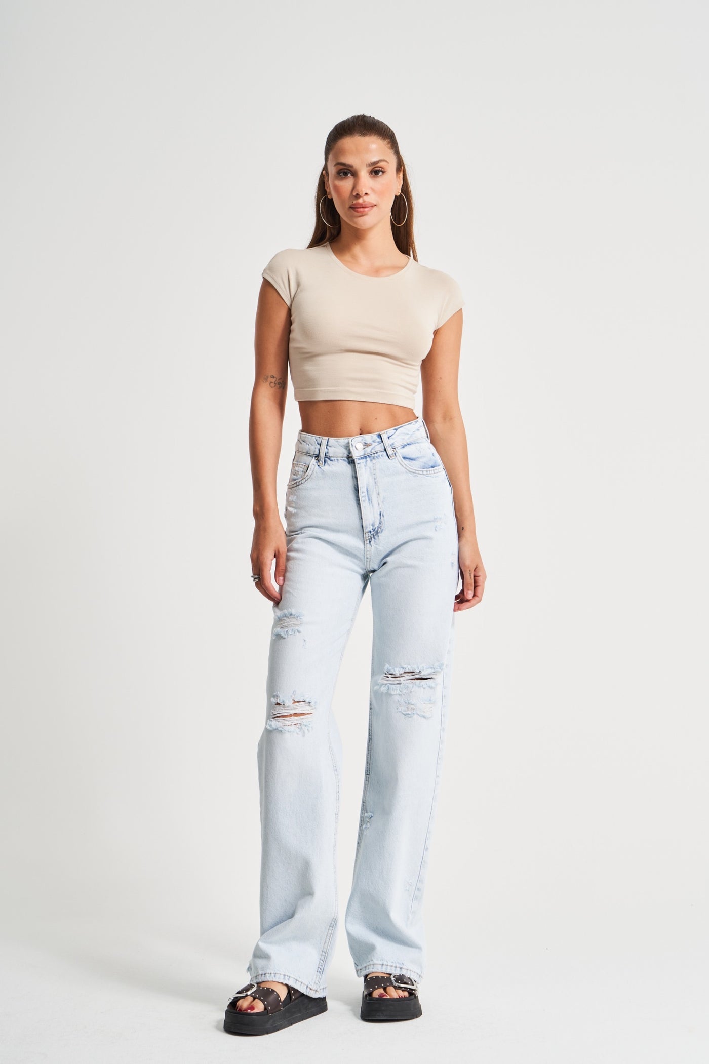 KAYA HIGH-WAIST RIPPED JEANS